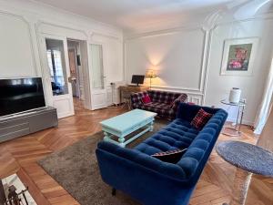 TV a/nebo společenská místnost v ubytování Superbe 120m2 17ème - 6p