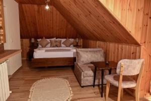 Rúm í herbergi á Hotel Zallina