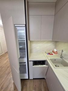 Køkken eller tekøkken på Platinum Apartment + 14 billeder