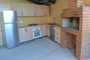 Kuchyň nebo kuchyňský kout v ubytování Blue Horizon