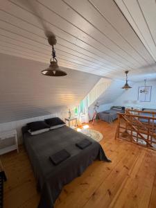 a bedroom with a bed and a table in a room at Vaide in Vaide