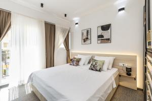 Letto o letti in una camera di *NEW IN 2025* - Hotel Subra Atrium