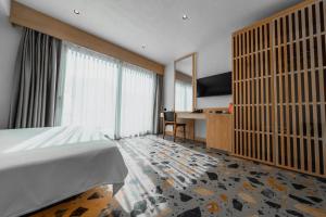 Et tv og/eller underholdning på Casa Colore Boutique House