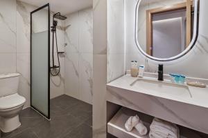 Koupelna v ubytování Regency Inn