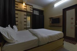 Μια τηλεόραση ή/και κέντρο ψυχαγωγίας στο Hotel The Grand Kailash