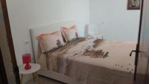 Postel nebo postele na pokoji v ubytování Penthouse apartment