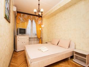 Apartlux on Novy Arbat Street 객실 침대