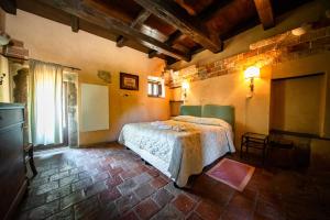 Albergo Diffuso - Rocca Calascioにあるベッド