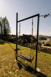 Gallery image of Najwyzej - domek z sauną w Gródku nad Dunajcem nad Jeziorem Rożnowskim in Gródek Nad Dunajcem +11 photos