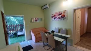 Posezení v ubytování Apartment Igralište Mirakul