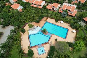 an overhead view of a resort with two swimming pools at Biệt Thự C19 Mũi Né Domaine in Ấp Chợ Dinh