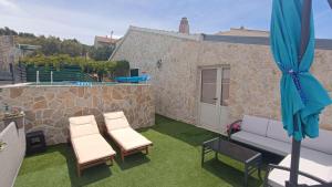 Patio nebo venkovní prostory v ubytování Apartment Igralište Mirakul