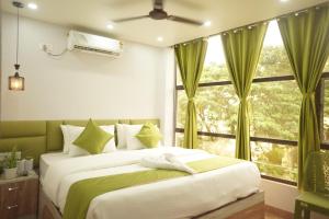 Postel nebo postele na pokoji v ubytování Hotel Raventa + 16 fotografií