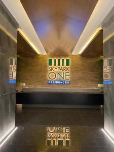 a lobby with a star park one refugees sign on the wall at Sky Park Tower Premium Apartments Gulberg Greens Islamabad in Islamabad
