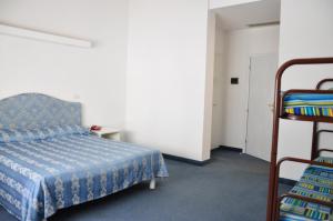 Postel nebo postele na pokoji v ubytování Hotel Sirena