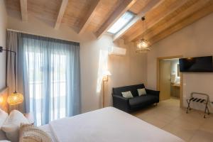 TV a/nebo společenská místnost v ubytování Telesilla Hotel
