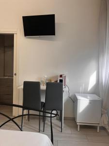TV a/nebo společenská místnost v ubytování RoomsCarli
