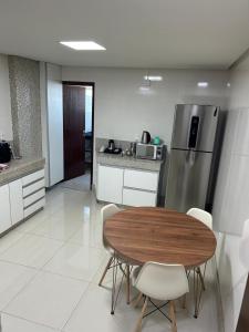 Kuchyň nebo kuchyňský kout v ubytování Apartamento Bom Despacho-MG