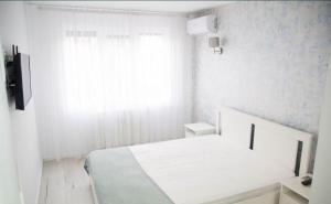 Ένα ή περισσότερα κρεβάτια σε δωμάτιο στο Apartament Elegant & Central Complet Utiliat Self check-in