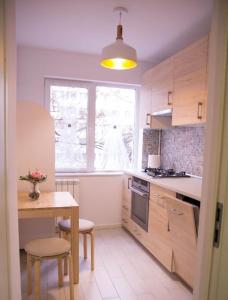 Η κουζίνα ή μικρή κουζίνα στο Apartament Elegant & Central Complet Utiliat Self check-in