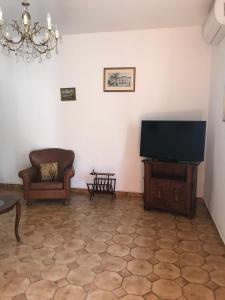 Μια τηλεόραση ή/και κέντρο ψυχαγωγίας στο Tra gli ulivi +25 φωτογραφίες