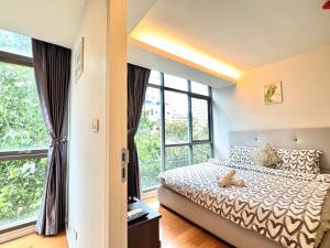 Postel nebo postele na pokoji v ubytování Central Living Ploenchit + 53 fotografií