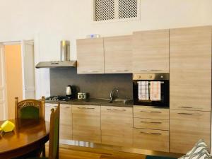 Η κουζίνα ή μικρή κουζίνα στο Le Dimore del Golfo +15 φωτογραφίες