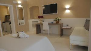 TV a/nebo společenská místnost v ubytování Borgo Marsala