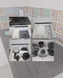 a model of a kitchen with a counter top at Nobre Flats 201 in Petrolina