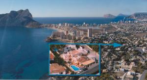 an aerial view of a city next to the ocean at Hostal Residencial La Paloma in Calpe