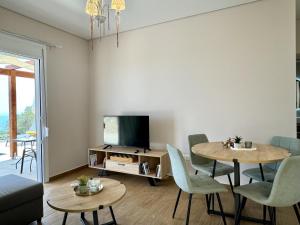 TV a/nebo společenská místnost v ubytování Villa Menta