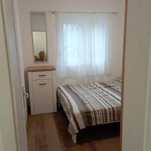 Postel nebo postele na pokoji v ubytování Nice summer apartment near sea