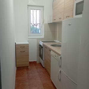 Kuchyň nebo kuchyňský kout v ubytování Nice summer apartment near sea