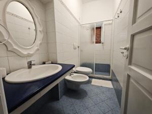 Koupelna v ubytování Hotel Rodà
