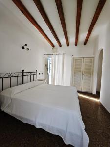 Postel nebo postele na pokoji v ubytování Hotel Rodà