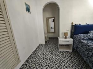 Postel nebo postele na pokoji v ubytování Hotel Rodà