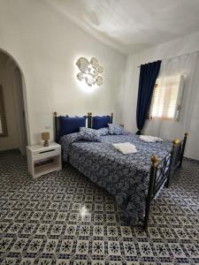A bed or beds in a room at Hotel Rodà