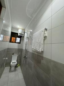 Koupelna v ubytování Bliss Ville Homes Buziga + 4 fotografie
