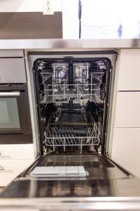 Dapur atau dapur kecil di Kozy apartment near Bergen city center with free parking and Wifi