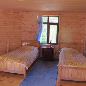 Postel nebo postele na pokoji v ubytování GuestHouse Ellie- Elisabeth