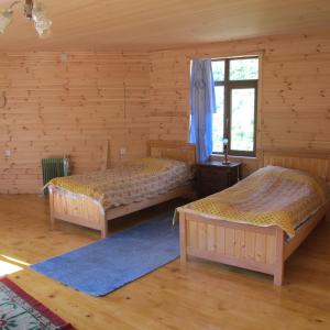 Postel nebo postele na pokoji v ubytování GuestHouse Ellie- Elisabeth