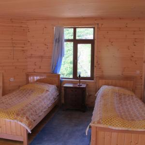 Postel nebo postele na pokoji v ubytování GuestHouse Ellie- Elisabeth