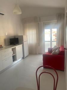 TV i/ili zabavni centar u objektu Appartamenti Le Mimose