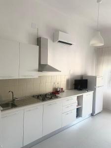 Kuhinja ili čajna kuhinja u objektu Appartamenti Le Mimose