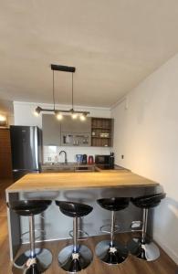 Kuchyň nebo kuchyňský kout v ubytování Beachfront Apartments Neves