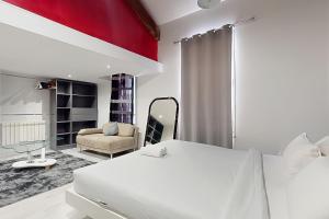 Ένα ή περισσότερα κρεβάτια σε δωμάτιο στο Loft cosy