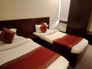 Hotel Azure客房内的一张或多张床位