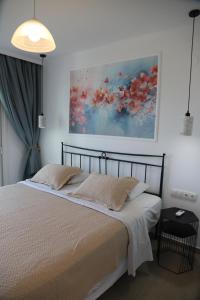 Olive Garden Villas and Apartments客房内的一张或多张床位