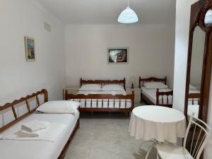 Postel nebo postele na pokoji v ubytování GuestHouse NOVI