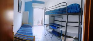 Ένα ή περισσότερα κρεβάτια σε δωμάτιο στο Erasmus Home